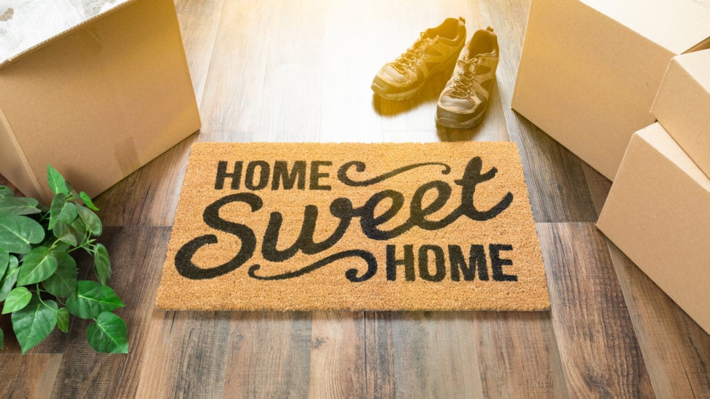 door mat with moving boxes